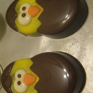 One dozen chick popping out of an egg chocolate covered sandwich cookie imagem 3