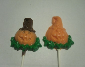 A dozen Halloween Jack o lantern pops