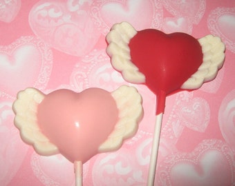 One dozen heart with wing lollipop sucker party favors