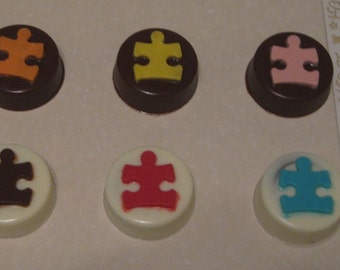 One dozen puzzle piece chocolate covered sandwich cookie party favors