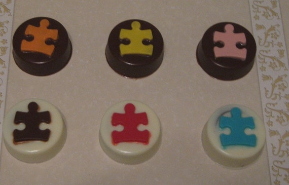 One dozen puzzle piece chocolate covered sandwich cookie party favors