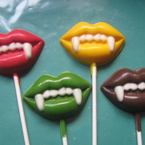 One dozen vampire fang lip lollipop sucker party favors