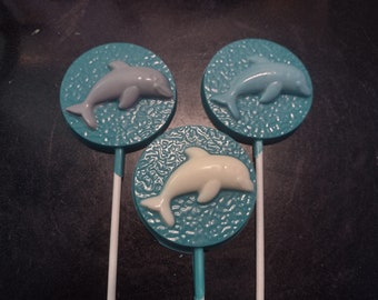 One dozen dolphin lollipop sucker party favors