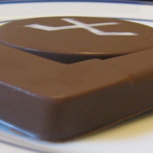 Solid chocolate hockey stick and hockey puck image 4