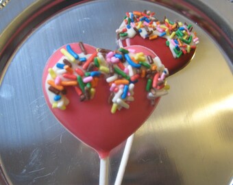 One dozen You Melt My Heart heart shaped lollipop suckers