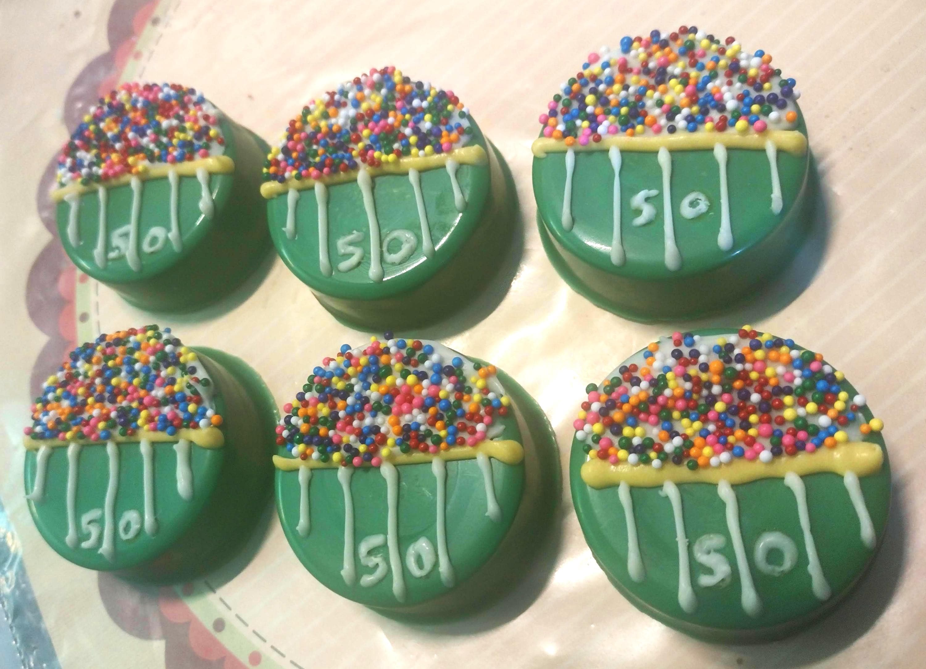 One dozen football yard-line chocolate covered sandwich cookies party favors