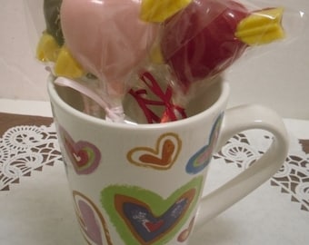 A dozen heart and arrow lollipops