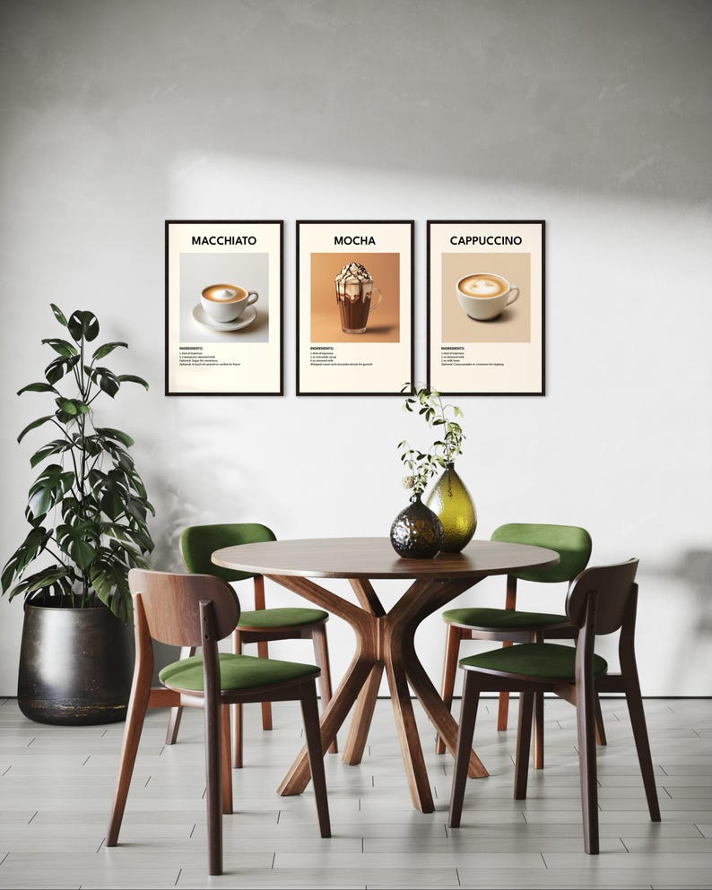 May include: Three framed posters with illustrations of different coffee drinks. The posters are titled "Macchiato", "Mocha", and "Cappuccino". Each poster features a stylized illustration of a coffee drink in a white cup with a brown background.