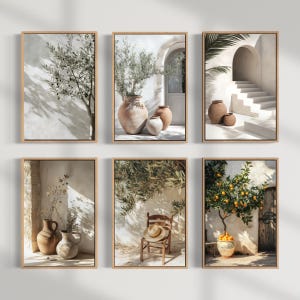 May include: Six framed art prints depicting Mediterranean scenes. The prints feature olive trees, terracotta pots, a wooden chair with a hat, and a staircase. The colour palette includes beige, brown, and green, creating a warm and inviting aesthetic.