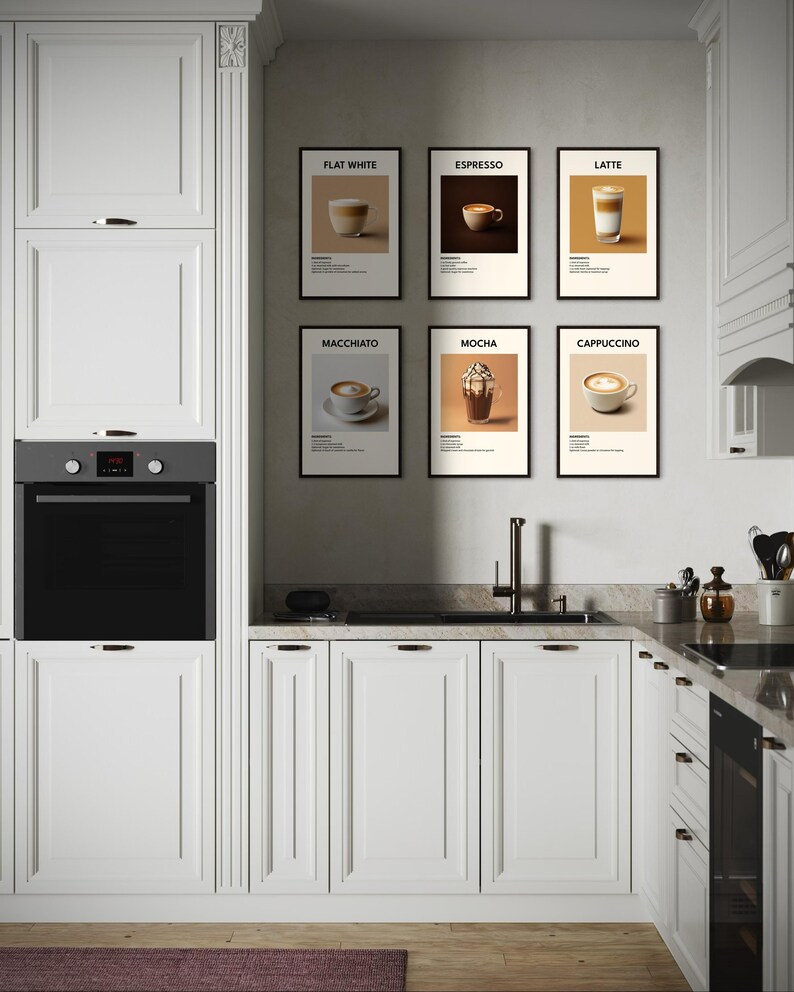 May include: Six black framed posters with white backgrounds and illustrations of different coffee drinks. The posters are arranged in two rows of three on a white wall in a kitchen. The posters are labeled "Flat White", "Espresso", "Latte", "Macchiato", "Mocha", and "Cappuccino".
