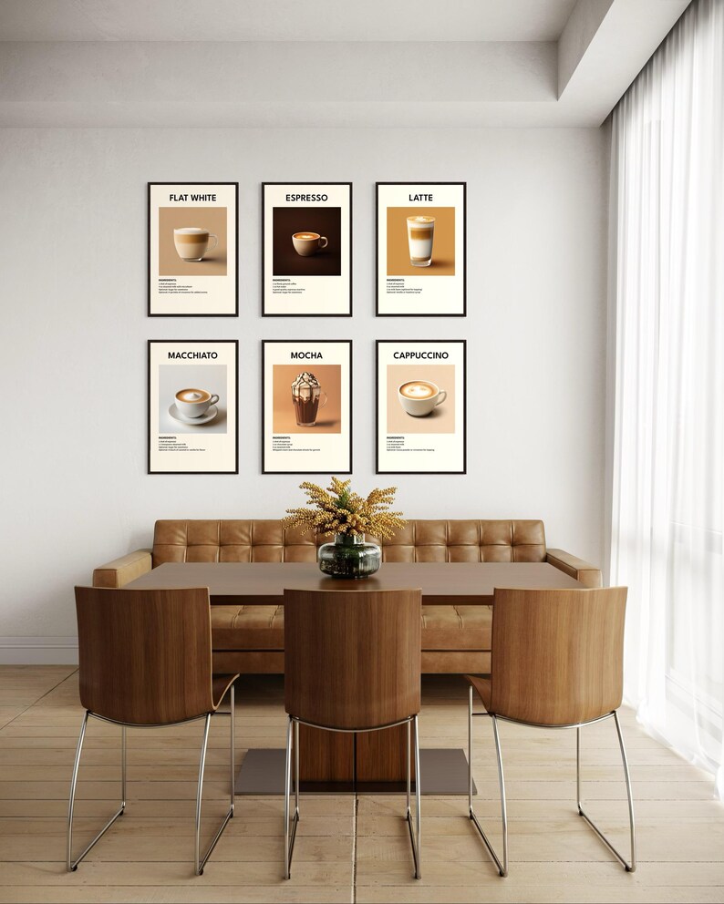 May include: Six minimalist posters with illustrations of different coffee drinks, including flat white, espresso, latte, macchiato, mocha, and cappuccino. The posters are hung on a white wall above a brown leather sofa and a wooden table with chairs.