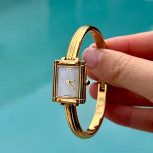 Reloj vintage YSL Yves Saint Laurent dorado: raro