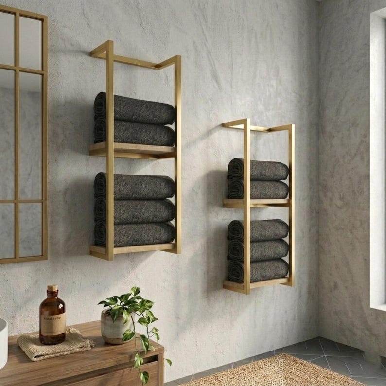 Wall mounted towel rack with shelves in modern bathroom
