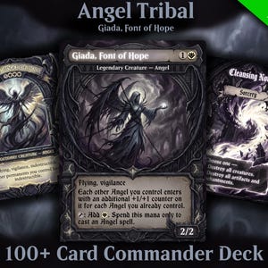 May include: Three collectible trading cards with angel-themed illustrations. The cards are dark with detailed angel and magical effect artwork. Text includes "Angel Tribal," "Giada, Font of Hope," and "100+ Card Commander Deck."