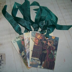 May include: Six vintage Christmas gift tags with green ribbon. The tags feature images of people celebrating Christmas and New Year's Eve. The text on the tags reads "A Happy New Year".