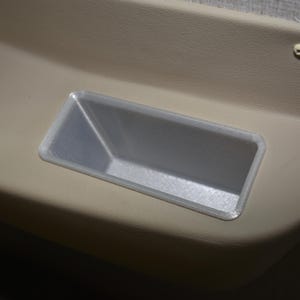 Deep Arm Rest Pockets for the Coachmen Mirada RV.