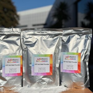 May include: Three silver bags of DTF Hot Melt Powder from Magic Print4U. Each bag has a label with the company logo and product name.