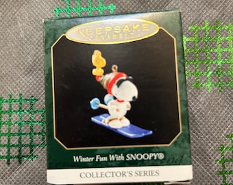 Rare 1999 Hallmark Winter fun with Snoopy ornament. Snoopy on skis.