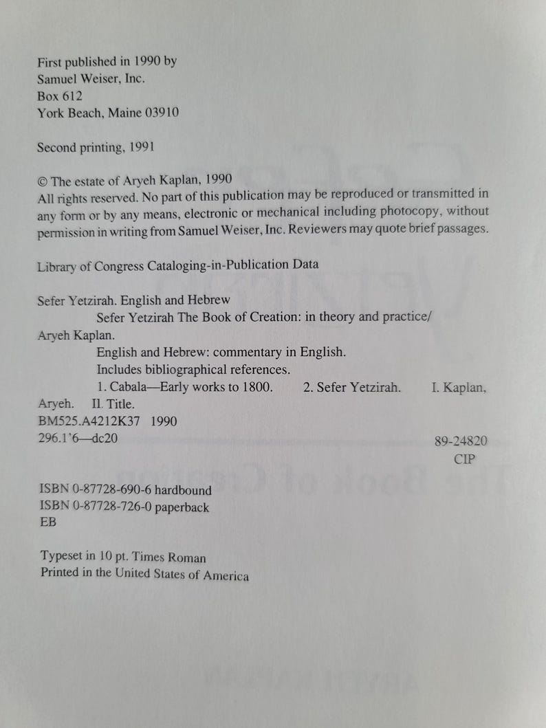 May include: A printed page from a book titled "Sefer Yetzirah The Book of Creation: in theory and practice" by Aryeh Kaplan. The text includes publication information, Library of Congress data, and ISBN numbers. The book was printed in the United States.