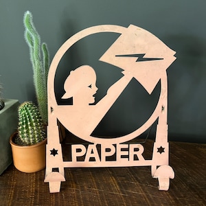 Portagiornale in metallo con ritaglio di Paper Boy, rosa chiaro invecchiato