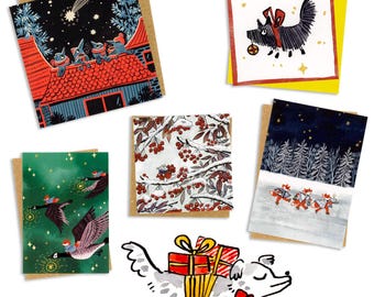 May include: A collection of illustrated greeting cards with various winter and holiday themes. The cards feature images of geese, dogs, and other festive scenes, with a mix of colors and designs. Each card is square and has a brown border.