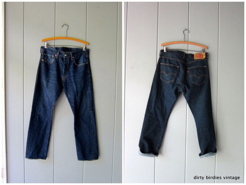 mens levi jeans with button back pockets