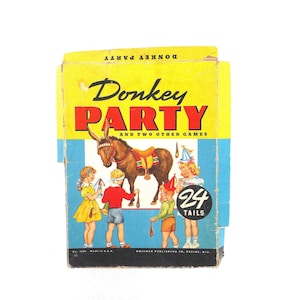 May include: Vintage "Donkey Party" game box. The box is yellow and blue with the title in large red and black letters. The image shows a donkey with children and the text "24 Tails".