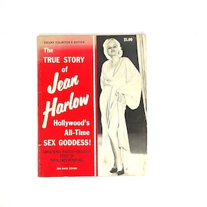 May include: A vintage paperback book titled The True Story of Jean Harlow. The cover features a red left panel with white text and a black and white photograph of Jean Harlow on the right. It includes the text Deluxe Collector's Edition $1.00.
