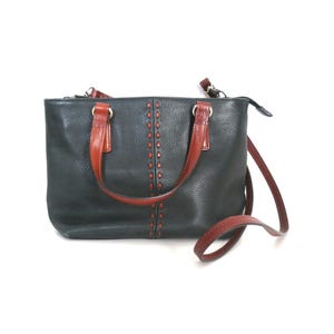 Monedero pequeño Fossil negro vintage de cuero negro con ribete marrón, bolso de mano tipo cartera para el hombro