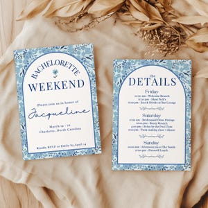 May include: Two blue floral-patterned cards. One reads "Bachelorette Weekend" with details for Jacqueline's celebration in Charlotte, North Carolina. The other card lists the event's schedule, including brunch, mani-pedis, and a farewell lunch.