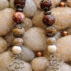 Mahogany obsidian, leopard skin jasper? White turquoise, cloud charms, hypoallergenic dangle earrings