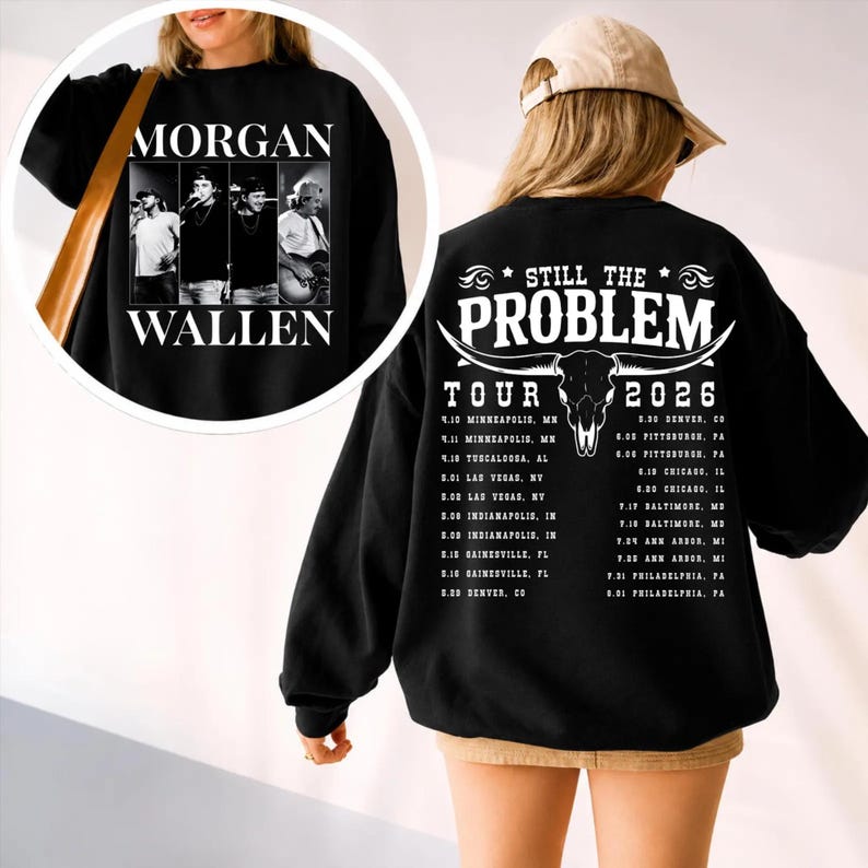 May include: Black sweatshirt featuring a graphic of Morgan Wallen with the text "MORGAN WALLEN" on the front. The back displays "STILL THE PROBLEM TOUR 2026" with a bull skull graphic and tour dates.