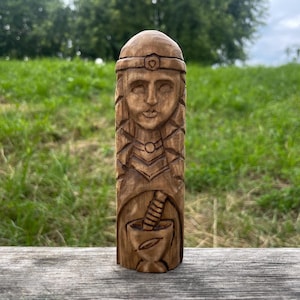 Small goddess asatru Eir statue. Norse pagan goddess figurine. Wooden statue scandinavian mythology. Sacred Valhalla. Wood carving.