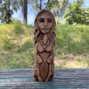 Small goddess asatru freya statue. Freyja norse pagan goddess figurine. Wooden statue scandinavian mythology. Sacred Valhalla. Wood carving.