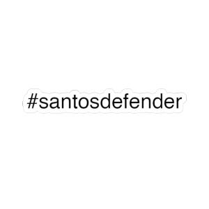 Könnte beinhalten: Weißer Aufkleber mit dem Text "#santosdefender" in schwarzer, serifenloser Schrift. Der Aufkleber hat einen weißen Rand und ist für die Anwendung auf verschiedenen Oberflächen geeignet.