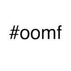 May include: A white sticker with the black text "#oomf". The hashtag symbol is followed by the letters "o", "o", "m", and "f". The sticker has a white border.