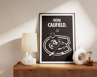 May include: Black and white poster with a hockey player in action. The poster has the text "GOAL CAUFIELD." with a signature below.