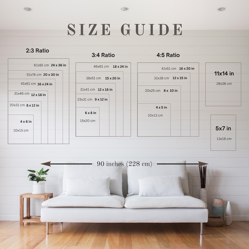 May include: A wall art size guide displays various rectangular dimensions in inches and centimeters, including 2:3, 3:4, and 4:5 ratios, and 11x14 and 5x7 inch sizes. The text "SIZE GUIDE" is at the top. A white sofa is below.