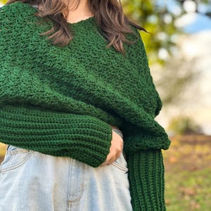 Versatile Crochet Wrap Sweater Scarf Design Green Yarn Material Handmade Winter Accessory Three Size Options Custom Fit Selection Textured Stitch Pattern Long Sleeve Detail Cozy Neck Warmer Forest Green Color Soft Acrylic Yarn Fashion