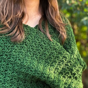 Versatile Crochet Wrap Sweater Scarf Design Green Yarn Material Handmade Winter Accessory Three Size Options Custom Fit Selection Textured Stitch Pattern Long Sleeve Detail Cozy Neck Warmer Forest Green Color Soft Acrylic Yarn Fashion
