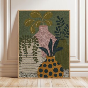 May include: A framed art print featuring a still life of decorative vases and plants. The vases are in various colors, including pink, green, and yellow with black polka dots. The background is a textured green, and the artwork is in a wooden frame.