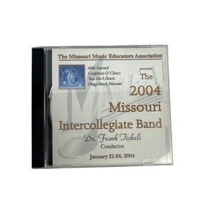 May include: A CD case featuring text for the Missouri Intercollegiate Band 2004. The case includes the text "The Missouri Music Educators Association" and "Dr. Frank Ticheli, Conductor". The CD case is clear with a white and tan insert.