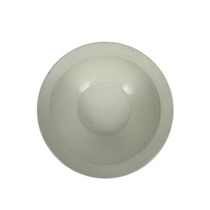 May include: A white, circular plastic object with a concave centre and a raised, rounded edge. The object appears to be a small bowl or lid, suitable for holding or covering items. The design is simple and functional.
