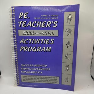 May include: A white ceramic mug with a black handle and the text "But First, Coffee" in a black, handwritten-style font. The mug is on a white surface.