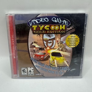 Könnte beinhalten: Eine PC-Spielhülle für Video Game Tycoon Gold Edition mit einer Grafik eines roten und gelben Autos, dem Scholastic-Logo und dem Text 8 Fun Games and 4 Interactive Tutorials Included sowie Make Your Own Video Games and Burn Them To CD.