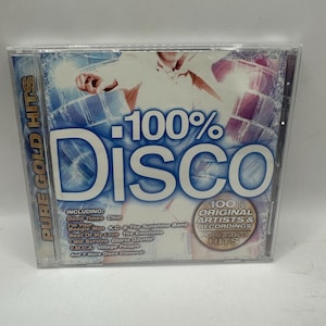 May include: A CD case for "100% Disco" featuring a blue and white design with the title in large letters. The CD includes tracks from various artists, including Chic and Gloria Gaynor. The case is labeled "Pure Gold Hits."