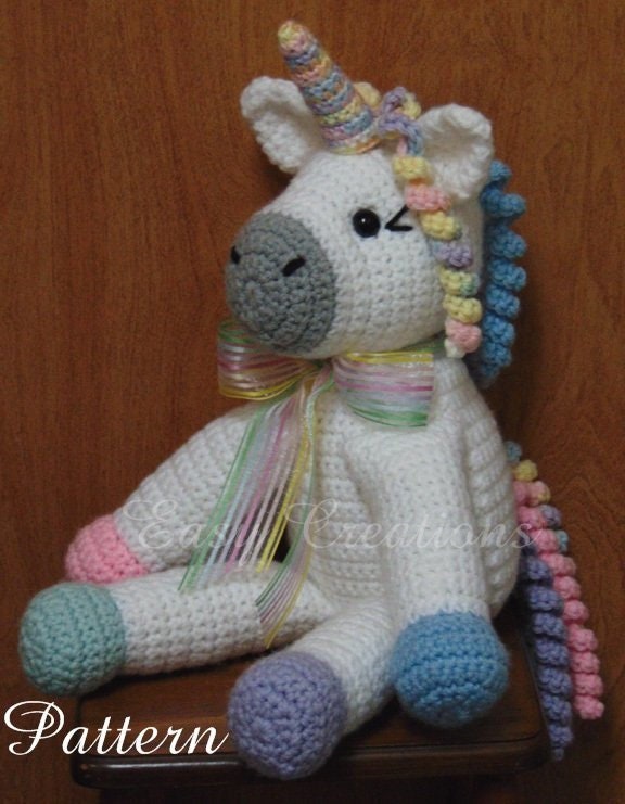 Stuffed plush white unicorn Knitted magic animal Plush crochet unicorn toy