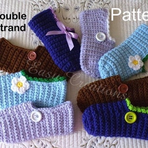 May include: A selection of handmade crochet slippers in shades of blue, brown, and purple. Each slipper is adorned with a button, and some have floral embellishments. The text "Double Strand" and "Pattern" are visible.
