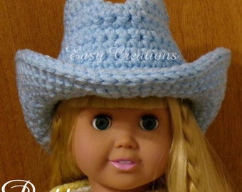 May include: A light blue crocheted cowboy hat with a structured crown and a curved brim. The hat features the text Easy Creations embroidered in white script across the front crown area and the word Pattern in white script below.