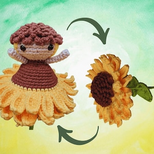 May include: A crocheted sunflower doll with a brown head and dress, yellow petals, and outstretched arms. The doll is shown next to a crocheted sunflower. The background is a watercolor wash of green and yellow.